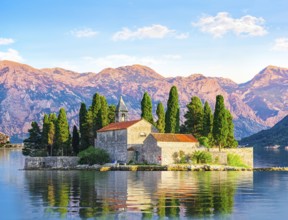Island of Saint George among the mountains of Perast, Montenegro, Europe