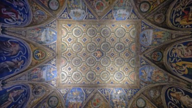Geometric ceiling design with intricate frescoes and a dominant blue theme, Rome, Lazio, Italy,