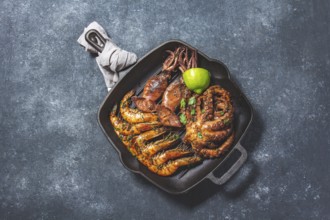 Food, Food, Grilled spimps, squids and octopus in cast iron grill pan