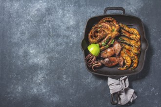 Food, Food, Grilled spimps, squids and octopus in cast iron grill pan