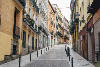 Madrid, Spain, October 2, 2020: Typical street amidst old residential buildings in the neighborhood
