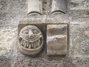 Sculpted face with sharp teeth, Sanctuary of Our Lady of Estíbaliz, Alava, basque country, spain