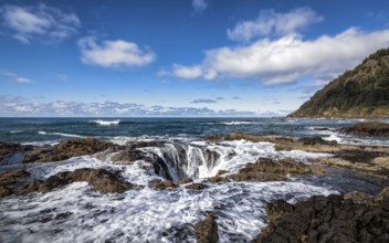 A stormy day at Thor's Well, central Oregon, USA. Color Image