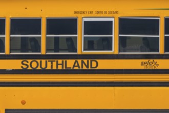 Calgary, Alberta, Canada. Mar 17, 2023. A close up to a Southland school Yellow bus
