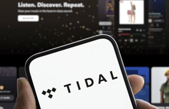 Tidal logo is displayed on smartphone. Tidal is a Norwegian-American music streaming service