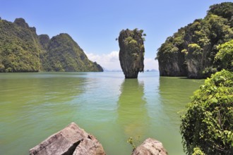 The magnificent island of James Bond. Island-vase in the greenish water of the southern seas.