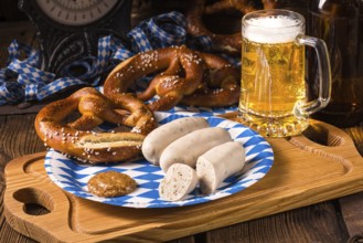 Bavarian sausage with pretzel, sweet mustard and beer