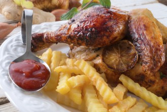 Chickens with French fries