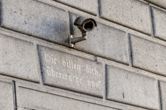 Surveillance camera on a building, symbol for surveillance, internal security, control, data