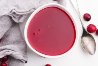 Bowl of Jelly with Cranberry on a white background