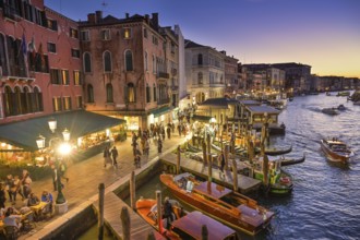 Evening view of the Riva del Ferro, jetty, gondolas, boats, Grand Canal, Venice, Veneto, Italy,
