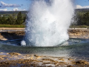 Eruption of the Strokkur geyser, hot springs, high temperature area in the Haukadalur valley,