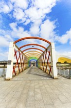 Magnificent light bridge over the river Aviles. The picturesque town of Avilas in Asturias. North