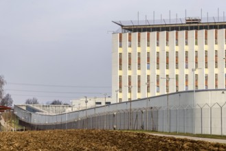 Stammheim prison, JVA. Exterior view with prison wall and barbed wire. Stuttgart,