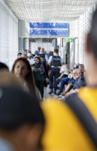 Police and people at Munich Airport, Bavaria, Germany