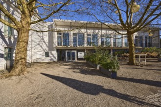 VHS Centre, Cafe Am Schloss, historical buildings, trees, flower pots, entrance area, blue sky,