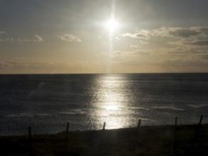 Sunrise over the sea at the Strait of Magellan, Punta Arenas, Chile