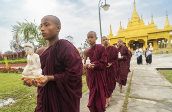 NAMSAI, INDIA.- APRIL 16: Buddhist monks carries the idol of Lord Buddha as they celebrate the