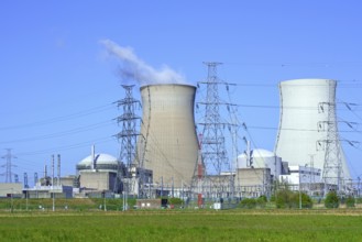 Cooling towers of the Doel Nuclear Power Station, nuclear power plant and high-voltage electricity