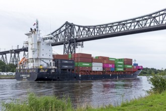 Container ship, cargo ship, high bridge, Kiel Canal, Rendsburg, Schleswig-Holstein, Germany