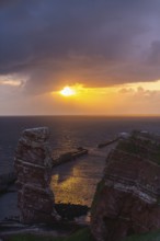 Evening shot, Lange Anna Felsen, red sandstone cliff, Lummenfelsen, cloudy sky, Helgoland Oberland,