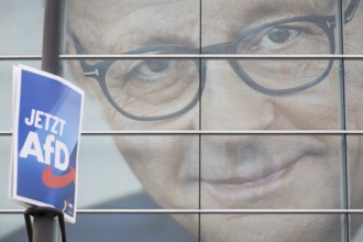 An election poster of the far-right AfD party (now AfD) hangs in front of a portrait of Friedrich