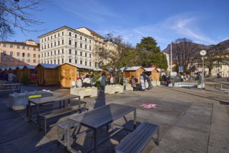 Christmas market in Piazza Manzoni square, Christmas stalls, market stands, outdoor area with