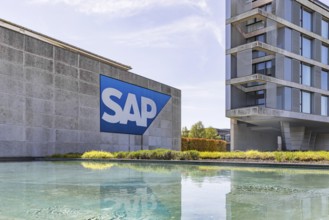 Logo and building of the listed software company SAP, headquarters. Walldorf, Baden-Württemberg,