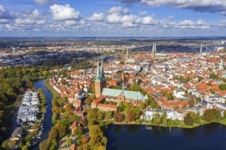 Aerial view over the river Trave and church towers in the old town of the Hanseatic City of Lübeck