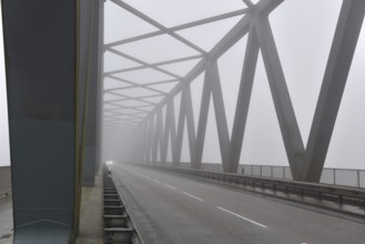 Grünental High Bridge on the Kiel Canal with fog, Schleswig-Holstein, Germany
