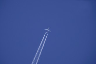 Aeroplane with contrails, Germany