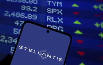 Stellantis logo is displayed on smartphone. Stellantis is a multinational automotive manufacturing