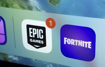 A close up of an iPad screen displaying the Epic Games and Fortnite app