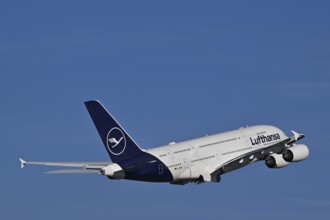 Lufthansa Airbus A380-800 taking off with blue sky and clouds, Runway North, Munich Airport, Upper