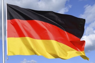 Close-up of the national flag of Germany fluttering in the wind, wave pattern