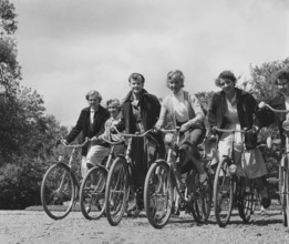 1950s cyclists. A group of young women on their bicycles. Swedish princess Birgitta far left.