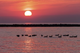 Sunset over Lake Huron as seen from the shoreline in Goderich, Ontario, Canada, North America