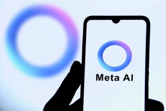 Meta AI logo on smartphone for Facebook Artificial Intelligence.