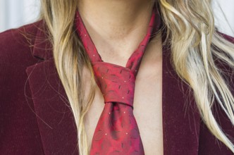 Great concept of women's rights, gender equality, gender, young blond and caucasian woman with tie
