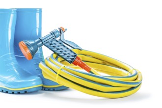 Garden tools rubber boots hose nad sprayer gun isolated