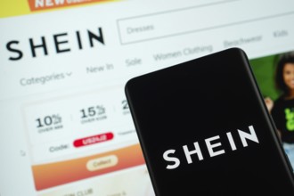 Dhaka, Bangladesh - 18 March 2025: The logo of the shein is displayed on a smartphone screen, and