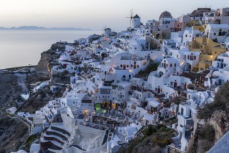 View of Oia, blue hour after sunset, Santorini, Cyclades, Greece