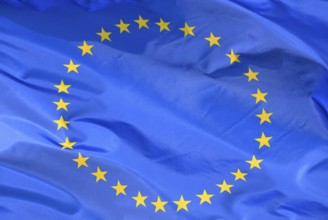 Close-up of the EU flag, flag of the European Union, with 27 stars fluttering in the wind