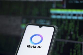 Meta AI logo on smartphone for Facebook Artificial Intelligence.