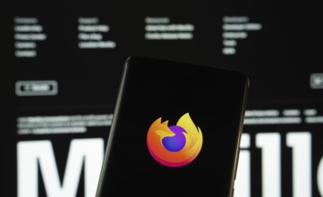 Dhaka, Bangladesh- 08 March 2025: mozilla firefox logo is displayed on a smartphone screen, with