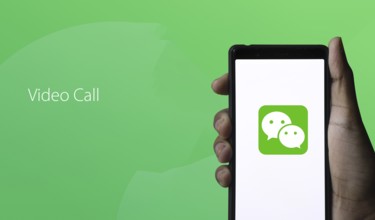 WeChat logo displayed on smartphone.