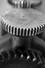 Black and white gear macro detail as a teamwork metaphor concept