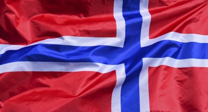 The flag of Norway flutters in the wind