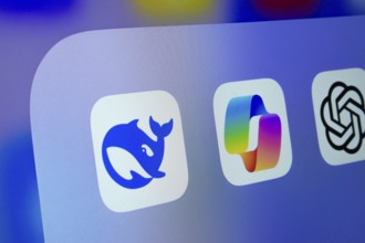 A close up of an iPad screen displaying the Deepseek, Copilot and ChatGPT app icon