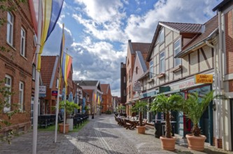 Buildings and shops in Lange Straße in the historic old town centre of Nienburg an der Weser.